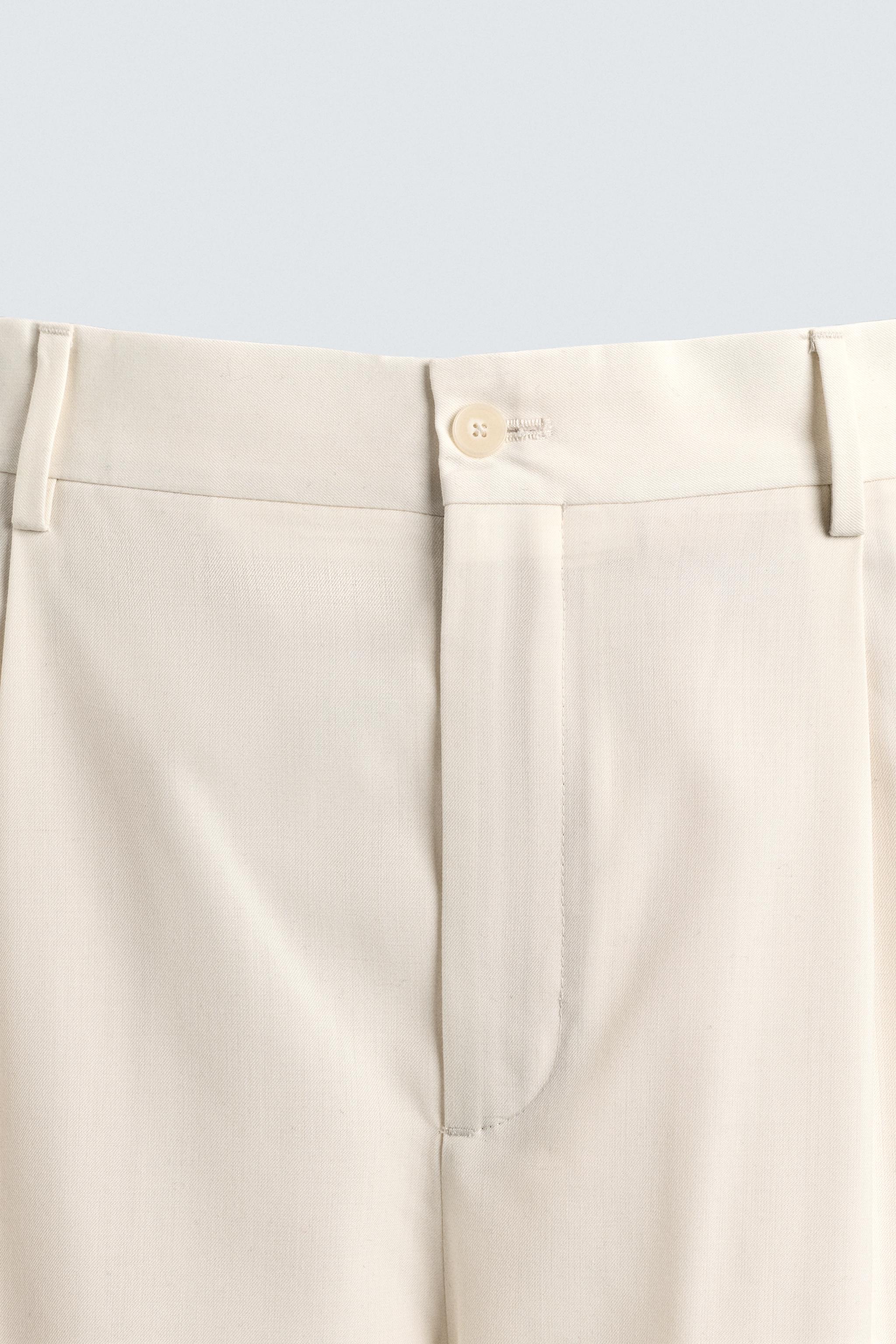 WOOL PLEATED PANTS